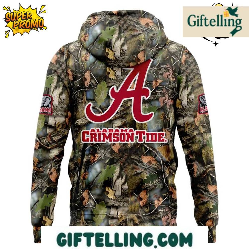 Honor tradition with a modern twist in the Alabama Crimson Tide Camouflage Patterns Hoodie 2025 camouflage hoodie that blends military-inspired design with championship team pride