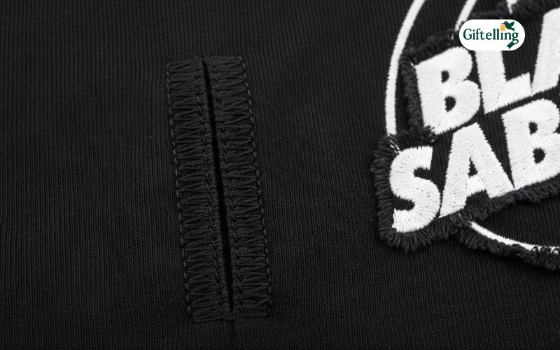 Fabric texture and construction detail showing Black Sabbath jersey cotton blend material and reinforced stitching quality