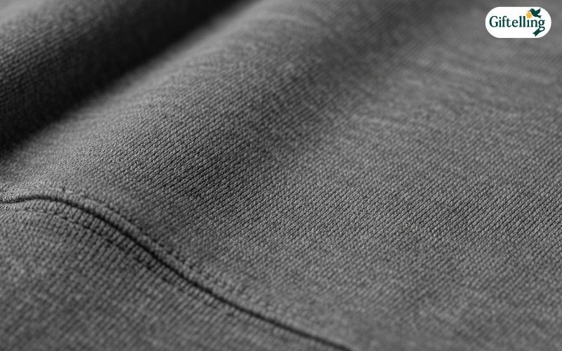 Close-up view of premium fabric texture showing high-quality cotton blend composition in custom hoodies