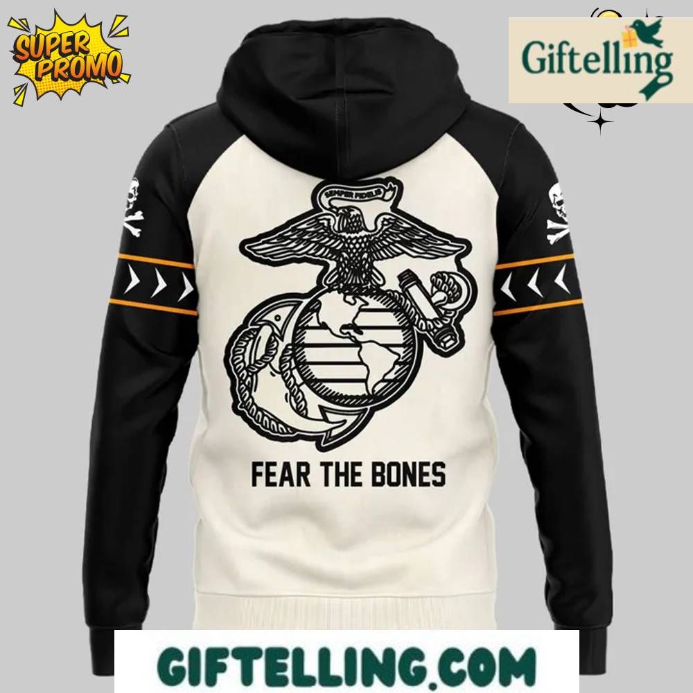 The "Fear The Bones" design theme of this Navy Midshipmen Limited Edition Hoodie incorporates intimidating imagery with Navy team identity