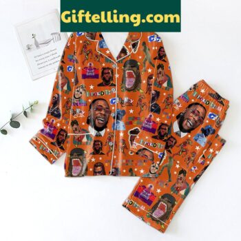 Burna Boy Told Him polyester pajamas set in orange, with top and bottom pieces