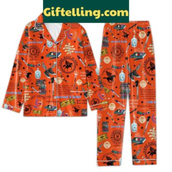 A Camp Half Blood Chronicles I'll Be Back Next Summer Pajamas Set, including a pair of pants and a matching top with a vibrant graphic print