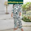 Philadelphia Eagles NFL Fly Eagles Fly Pajamas Set for women lounging on a couch
